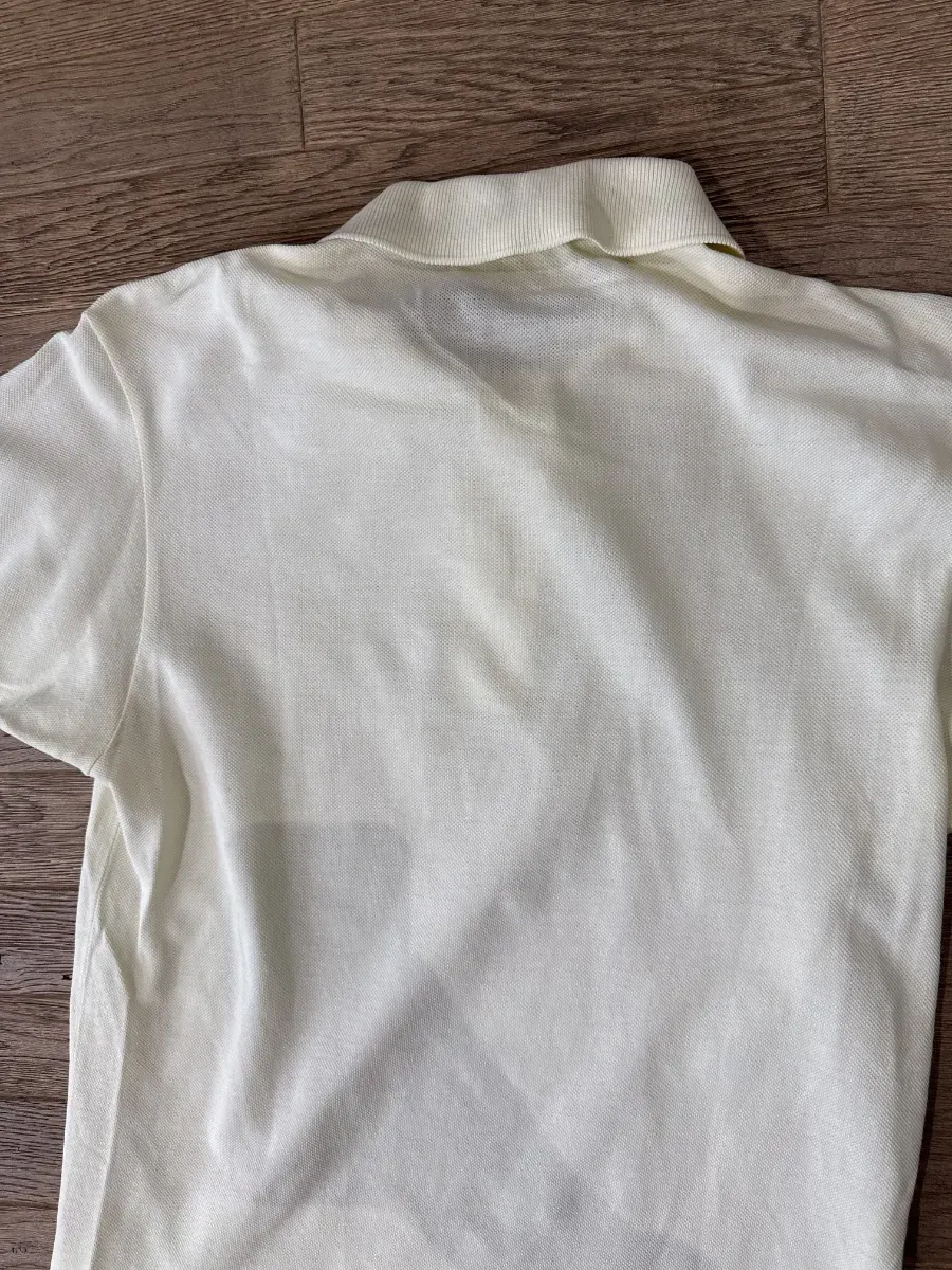 Pale yellow Lacoste polo 4
