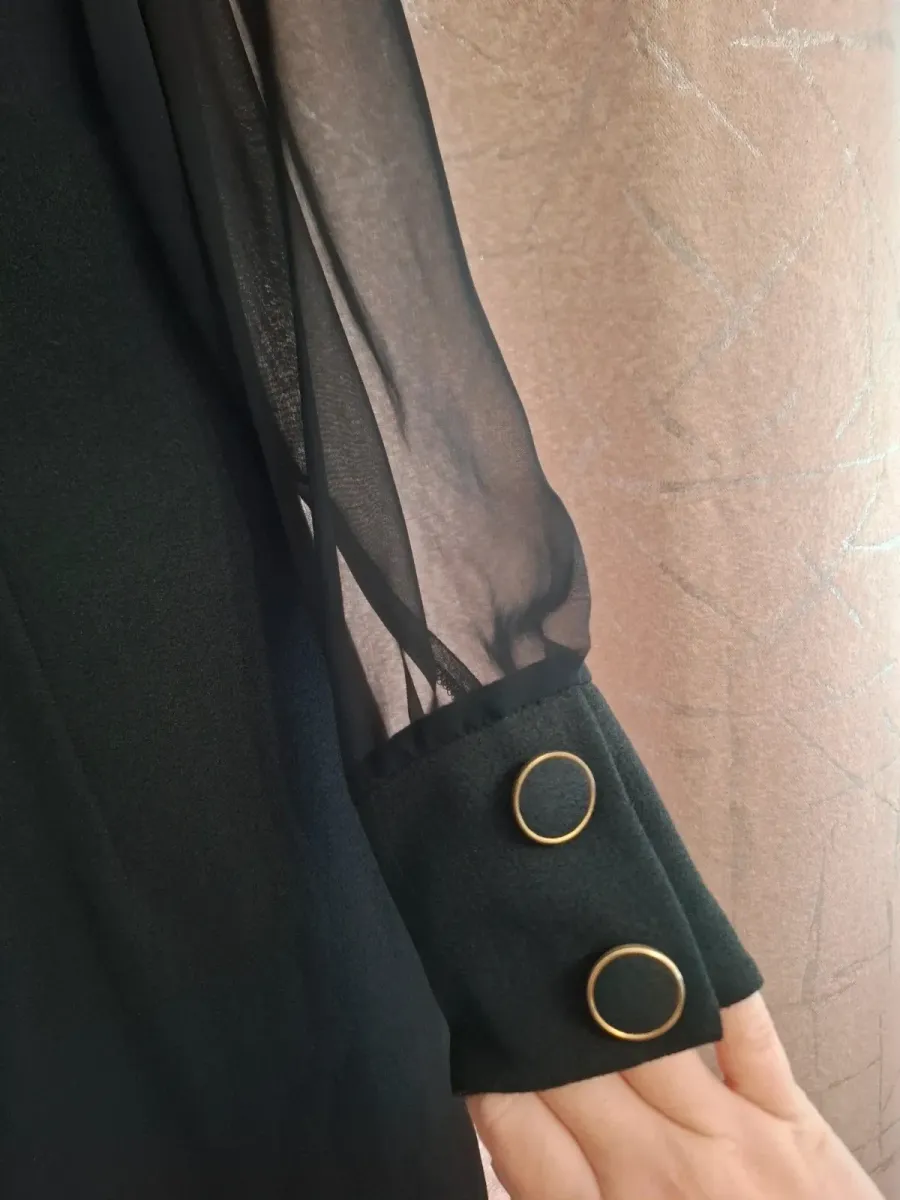 Robe Relance en noir, élégante pièce vintage. Très bon état. Taille L (40). 4
