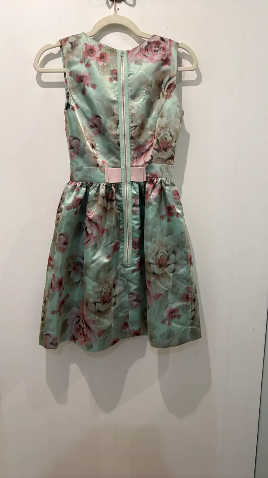 Mademoiselle Tara by Tara Jarmon sleeveless cocktail dress with light green and pink floral print, fitted cut and flared skirt. 4