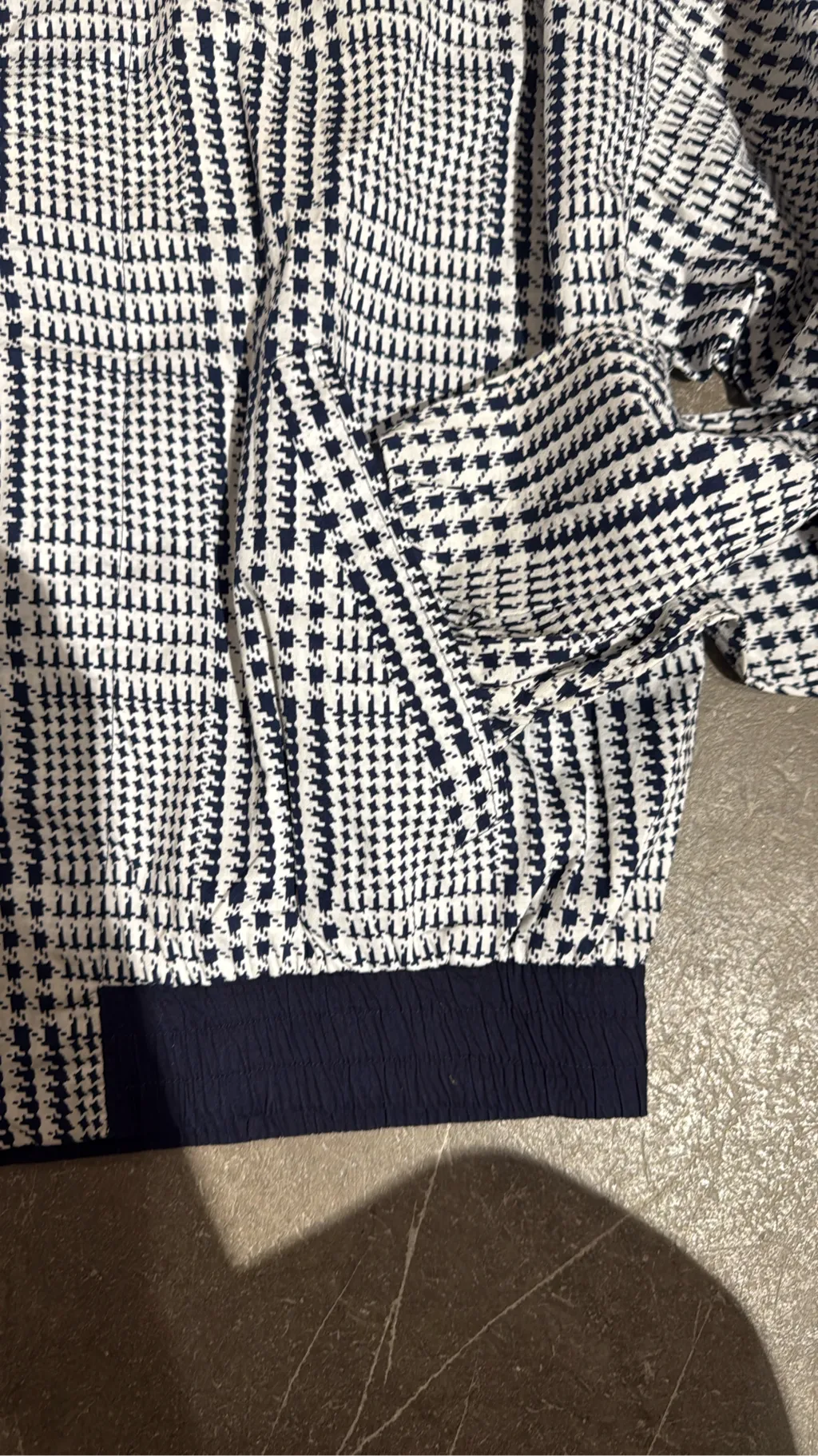 White and navy houndstooth bomber jacket with ribbed trim, size XL. 2