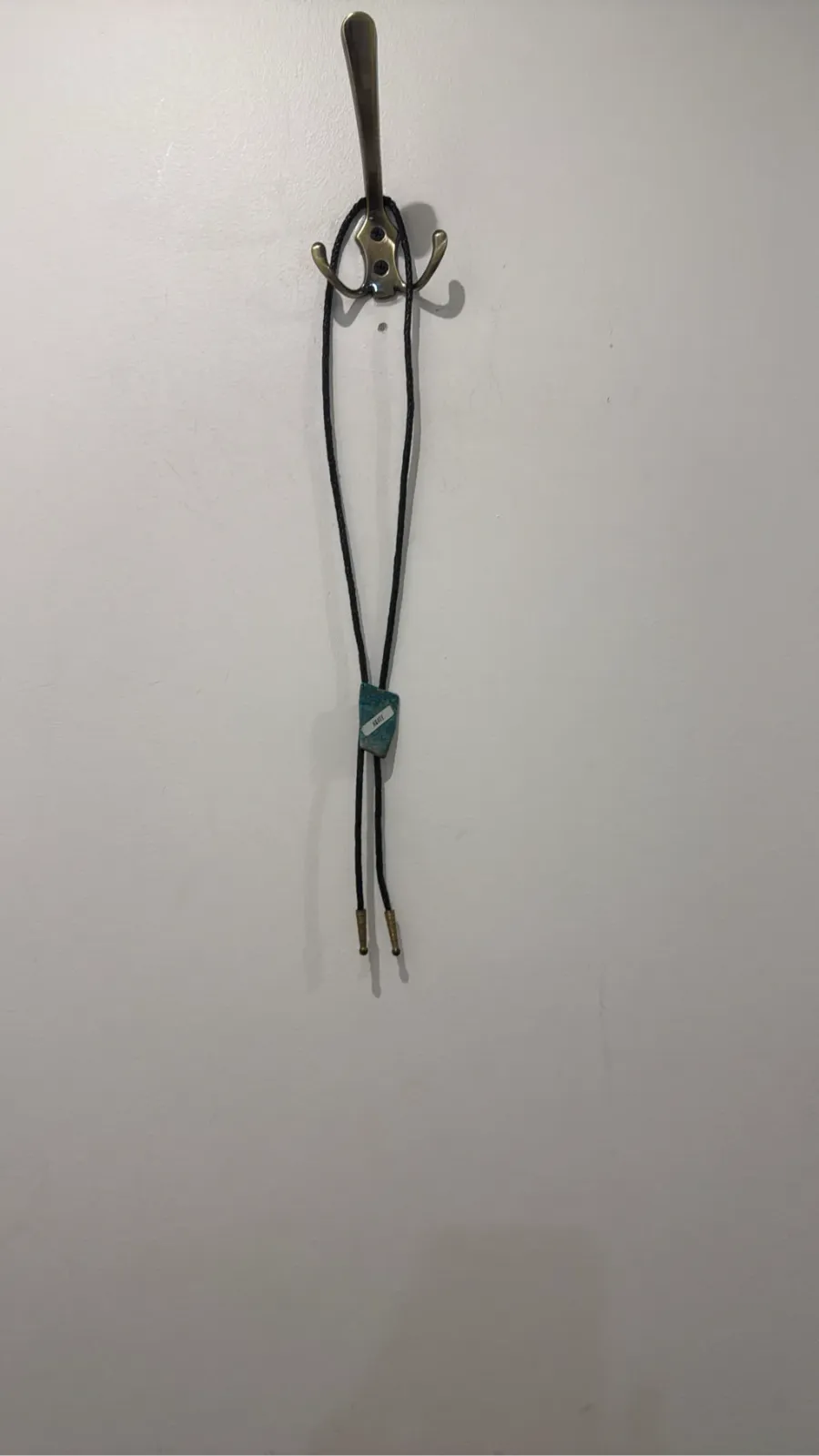 Vintage bolo tie with black braided leather cord and turquoise agate stone pendant