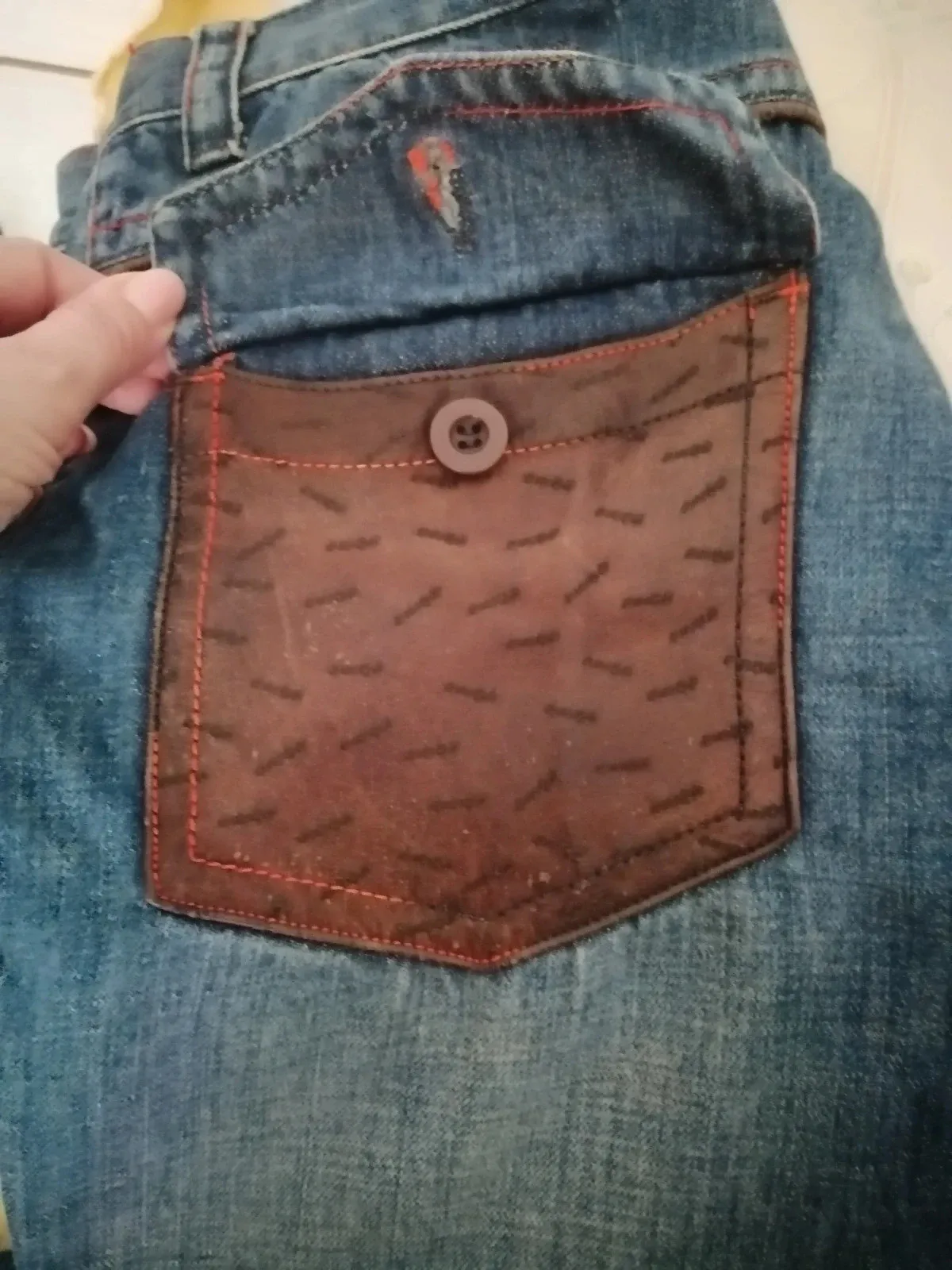 Capri avec poche arrière en cuir 11
