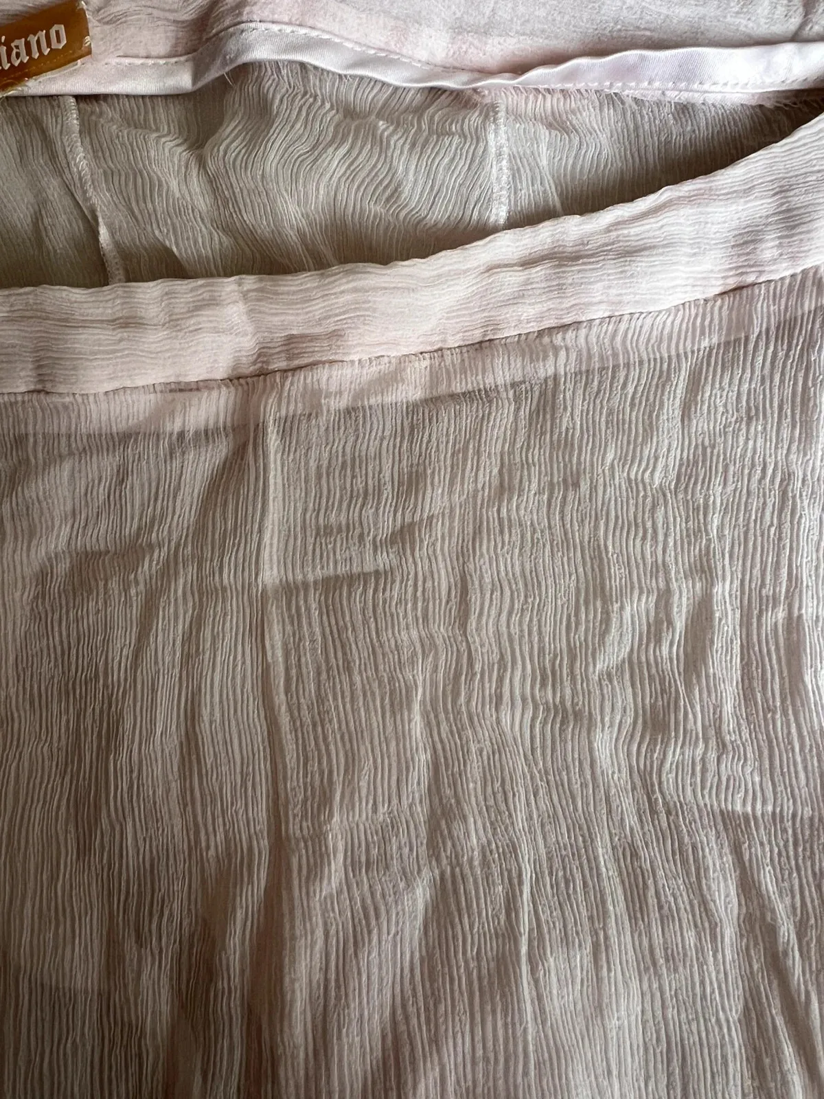 Never worn, label unstitched — see photo 4
