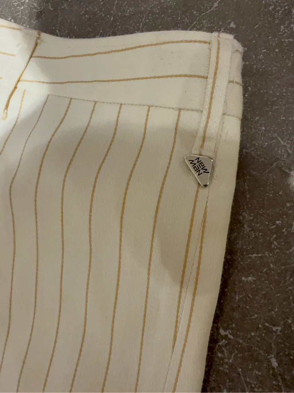 Ecru flared trousers with fine camel stripes by NEW MEN, made in France. 3