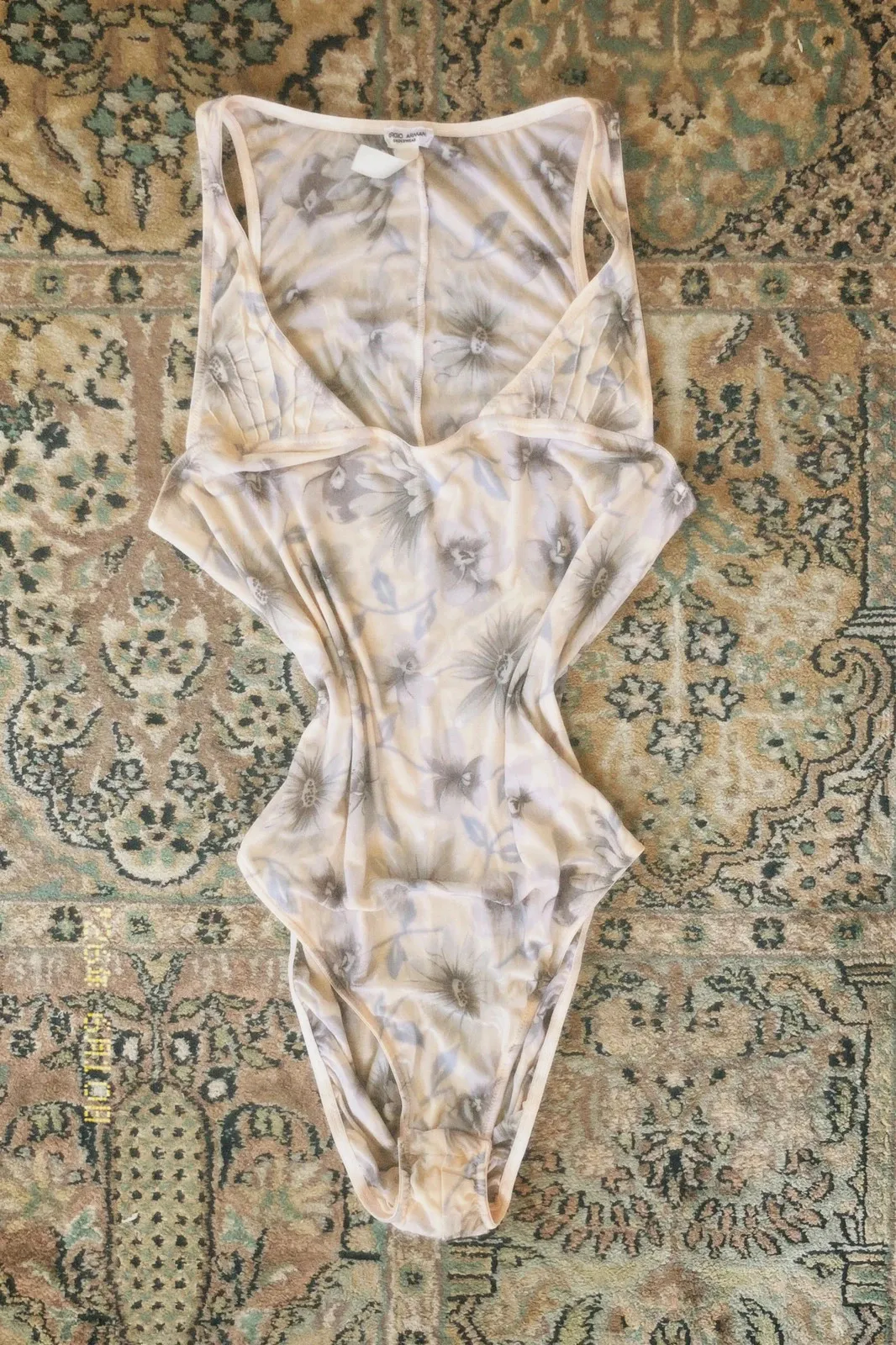 Giorgio Armani bodysuit, a piece from the great Italian house. Very good condition. Size S (36).