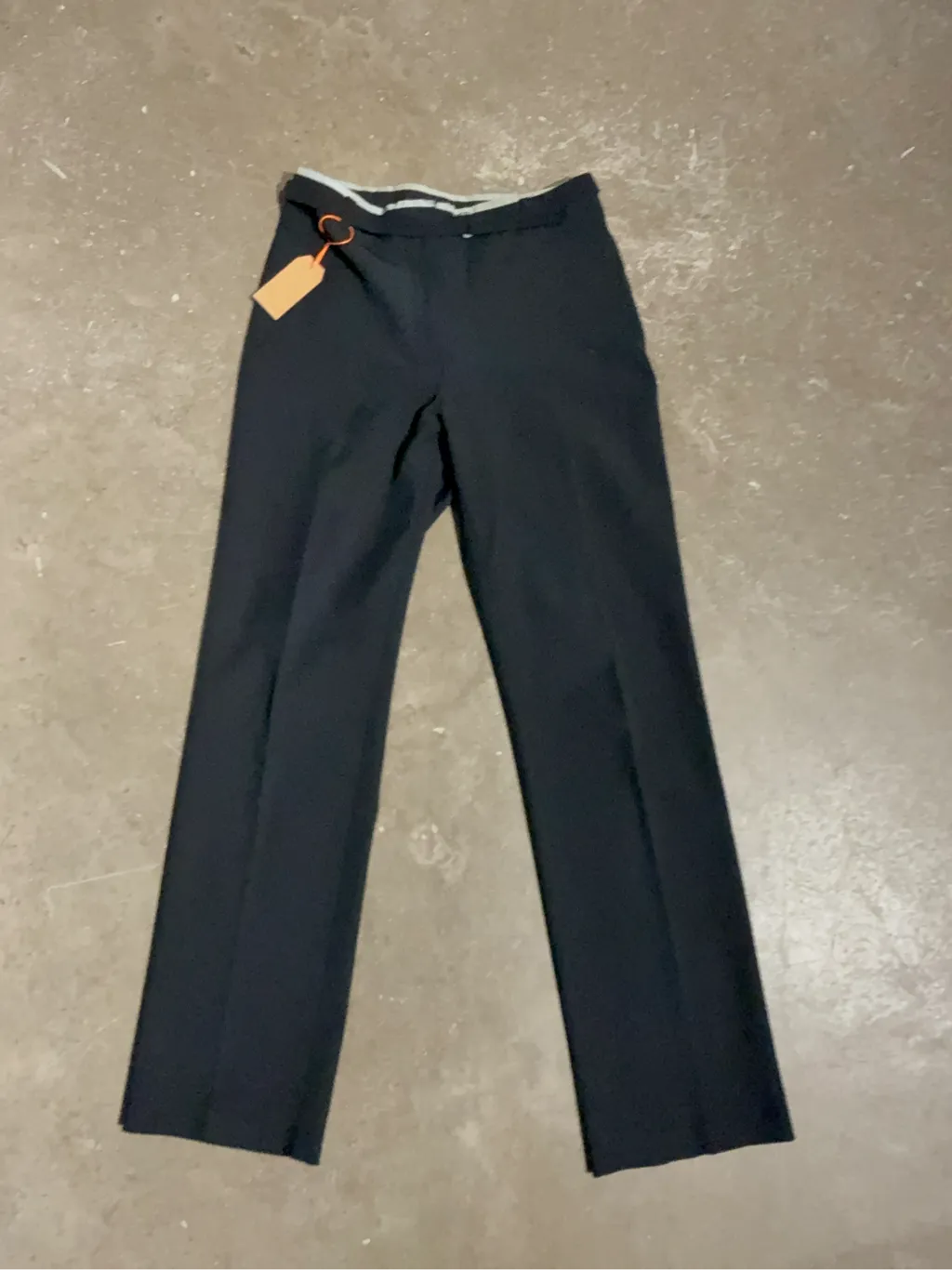 Pantalon de costume noir coupe droite de la marque Sinéquanone.
