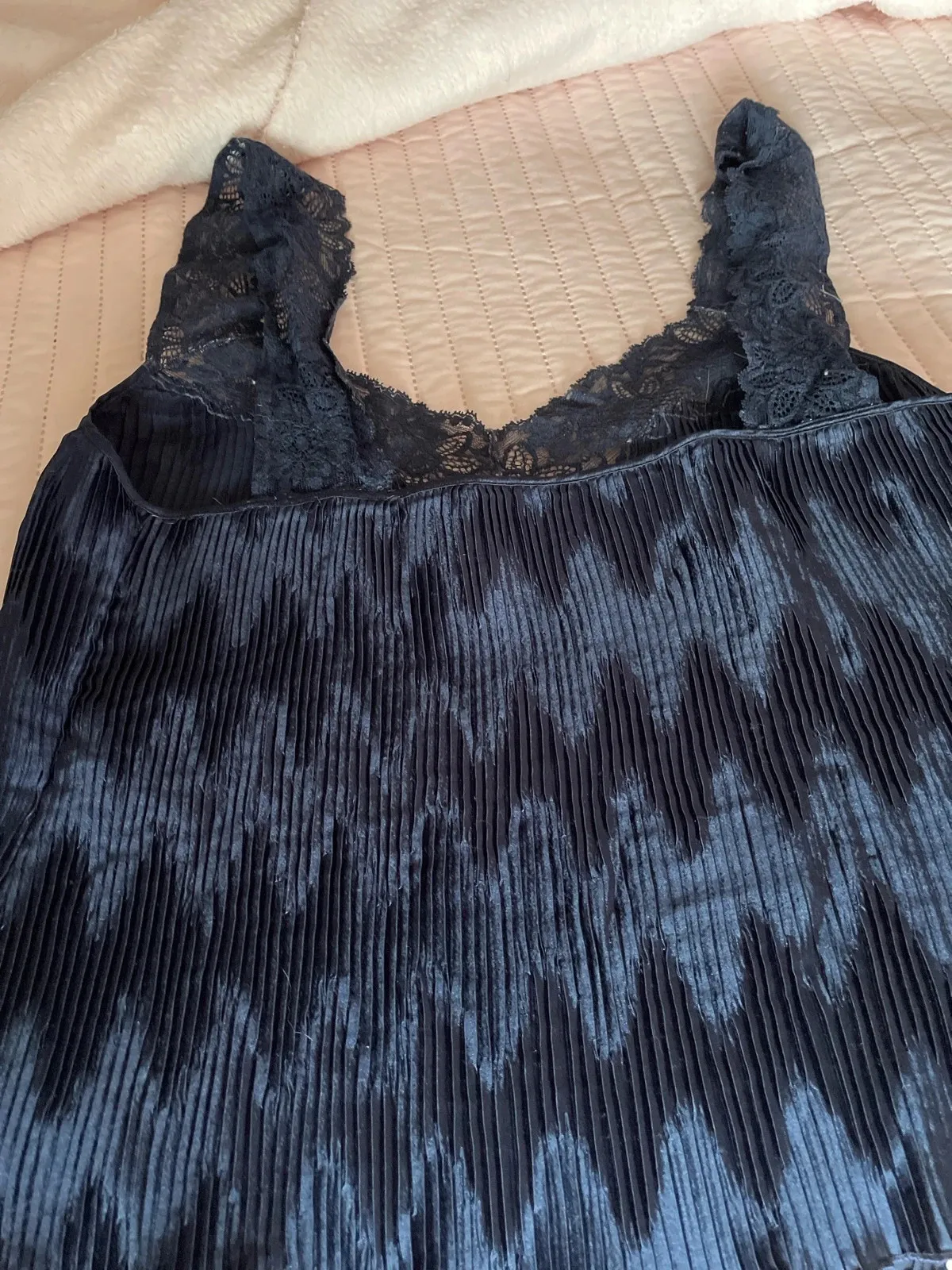 Stretchy, to wear under a dress or on its own. Navy blue moiré, fits sizes 40 to 44. Very good condition 5