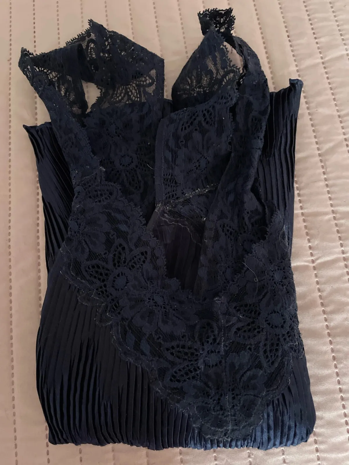Stretchy, to wear under a dress or on its own. Navy blue moiré, fits sizes 40 to 44. Very good condition 8
