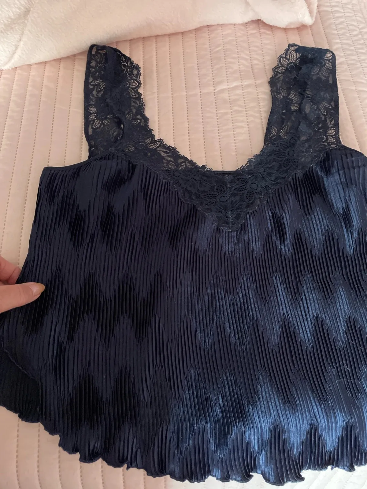 Stretchy, to wear under a dress or on its own. Navy blue moiré, fits sizes 40 to 44. Very good condition