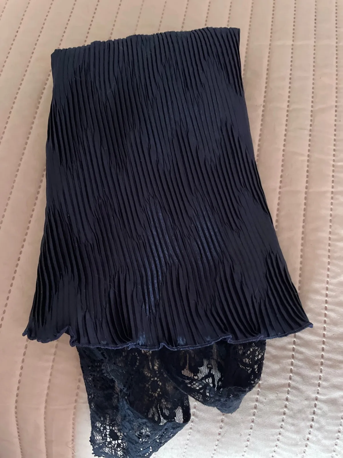 Stretchy, to wear under a dress or on its own. Navy blue moiré, fits sizes 40 to 44. Very good condition 9