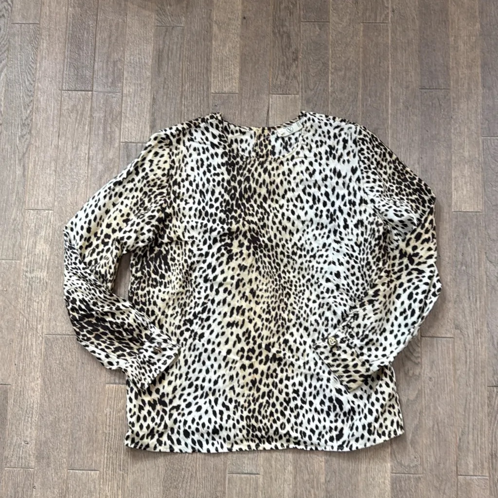 Vintage Valentino Miss V long-sleeved blouse with a classic leopard print. 1