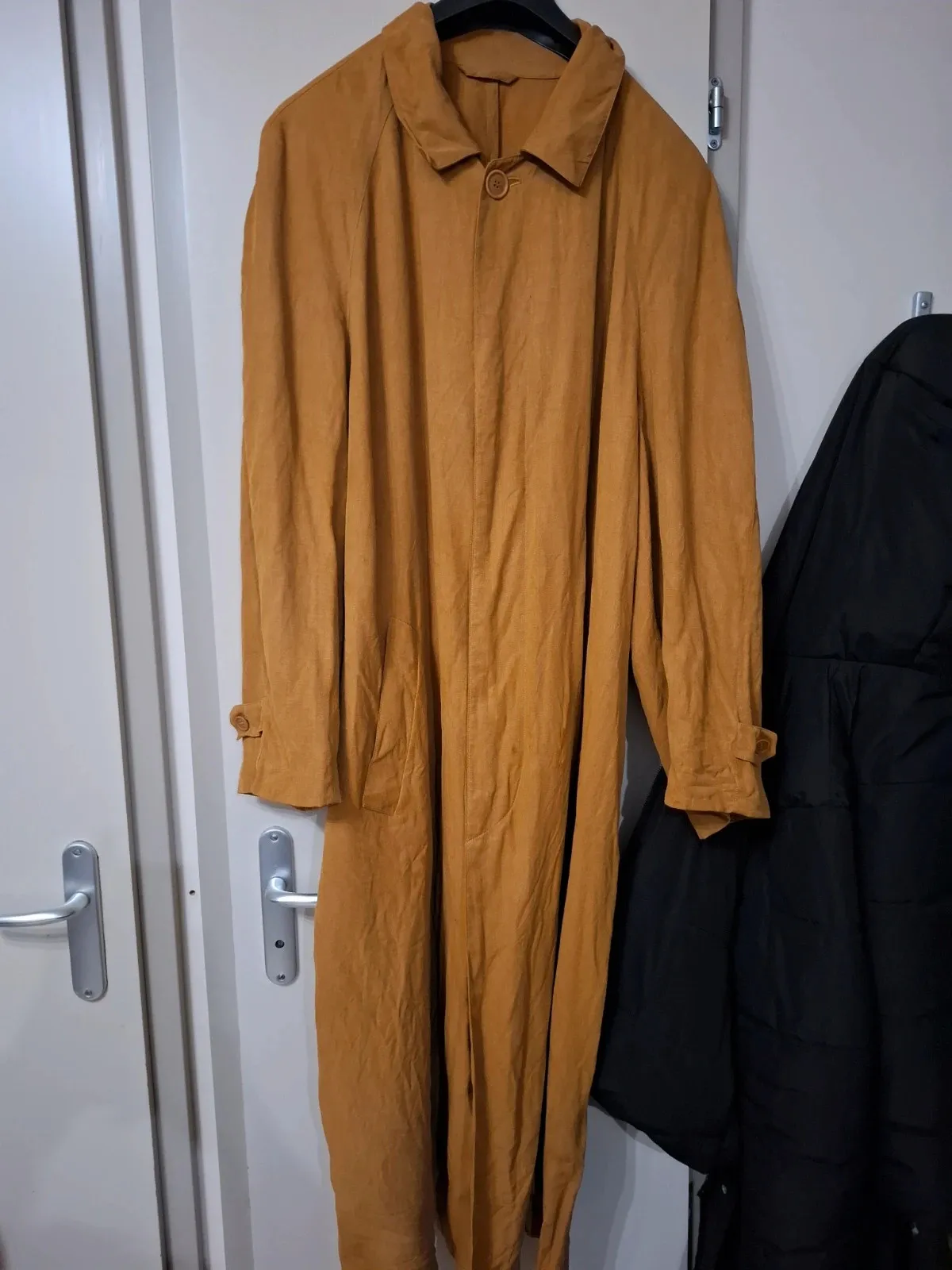 Long oversized silk coat.