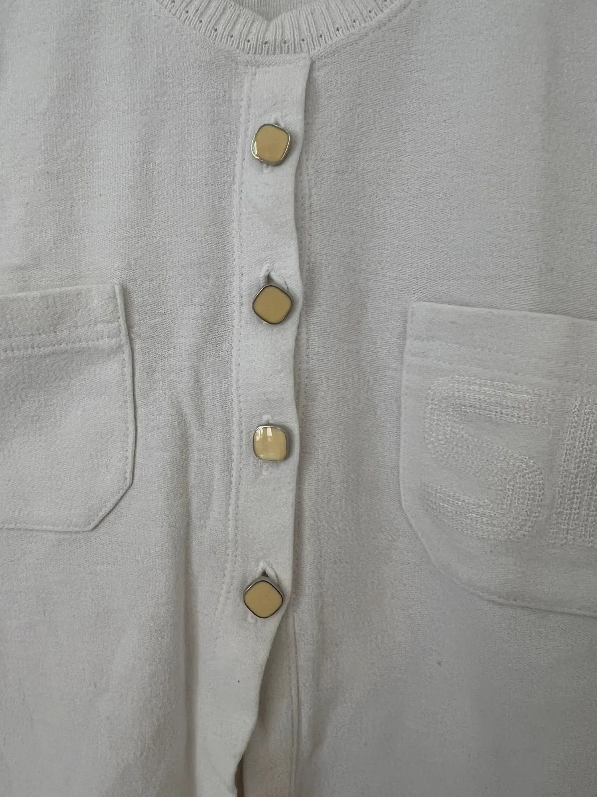 Good condition, no size label but fits 36-38. Small stain shown in photo.
SR initials on one pocket, visible seams. 3