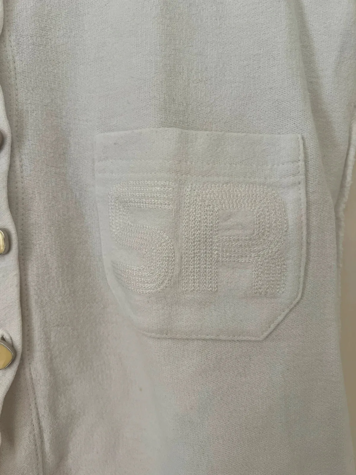 Good condition, no size label but fits 36-38. Small stain shown in photo.
SR initials on one pocket, visible seams. 4