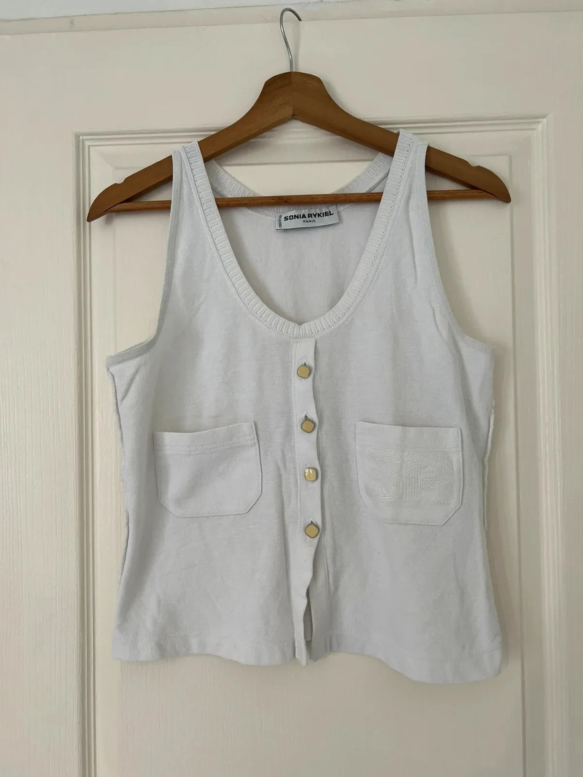Good condition, no size label but fits 36-38. Small stain shown in photo.
SR initials on one pocket, visible seams.