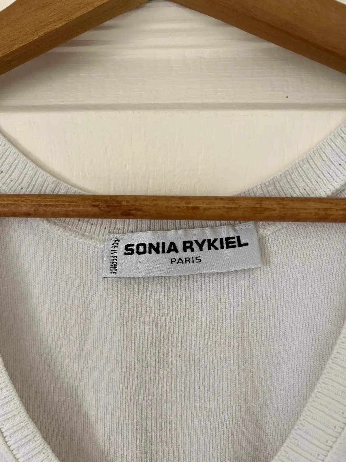 Good condition, no size label but fits 36-38. Small stain shown in photo.
SR initials on one pocket, visible seams. 5