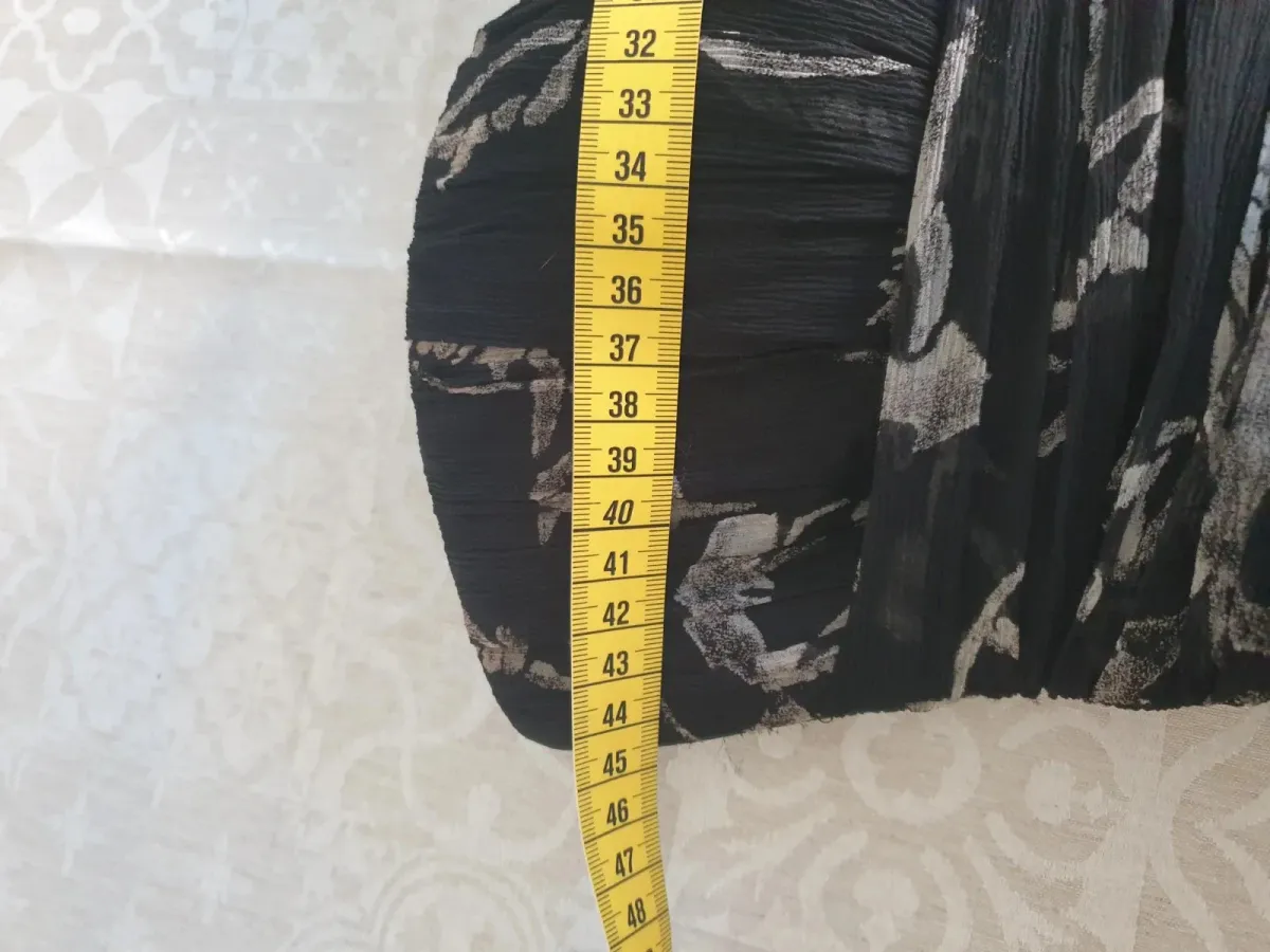 Robe bustier John Galliano, pièce de l'un des créateurs les plus inventifs de la mode. Très bon état. Taille M (38). 13