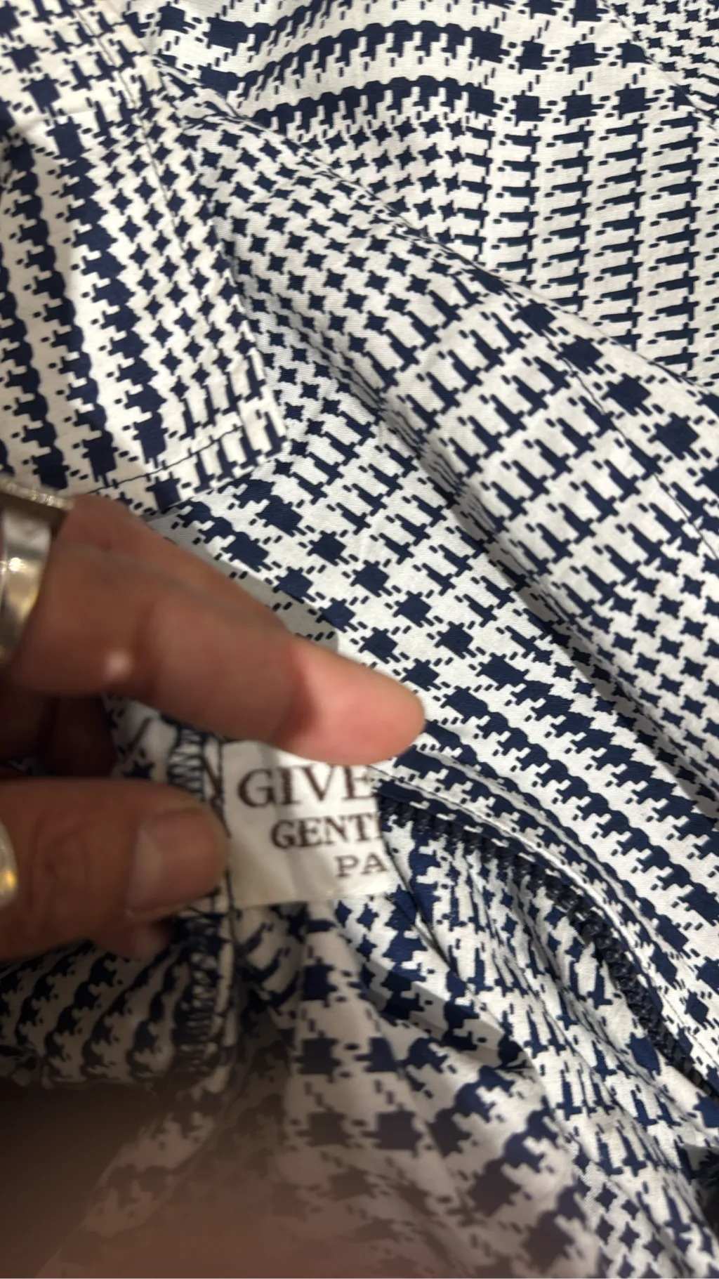 White and navy houndstooth bomber jacket with ribbed trim, size XL. 6