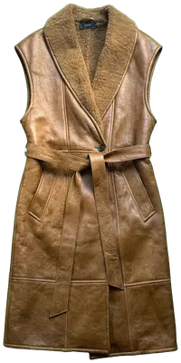 Joli manteau sans manche en vraie mouton retourné Doux à l’intérieur Couleur caramel Joseph Taille M (oversize peut aussi aller pour du L) Parfait état