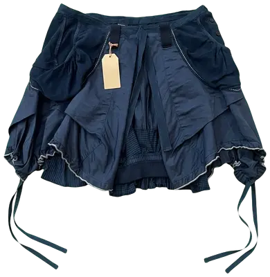 Short navy skirt with ruffles and corduroy details, adjustable ties and check lining, made in Italy.
