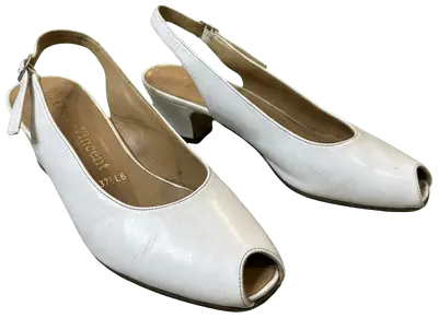 White leather peep-toe slingback sandals with a small block heel, made in France.