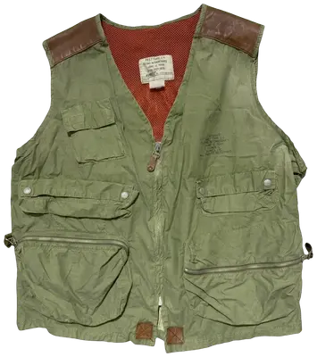 Gilet utilitaire vert kaki Avirex inspiré des vestes de vol C-1 de 1934, avec de multiples poches et des détails en cuir marron.