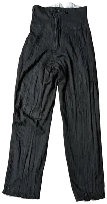 Jean Doma vintage à l'esprit western authentique. Bon état, taille XS (34). Une pièce intemporelle pour un look affirmé.