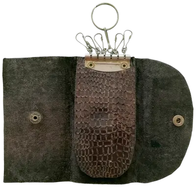 Porte-clés vintage en cuir marron, 6 crochets, en très bon état. Un accessoire intemporel et pratique pour organiser vos clés.