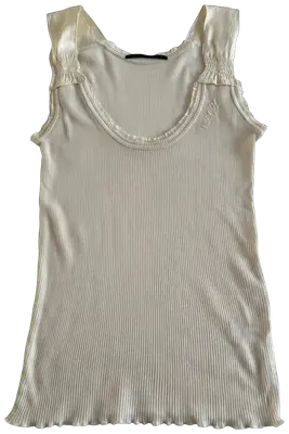 Beautiful fine top
Silk and cotton
Size 34